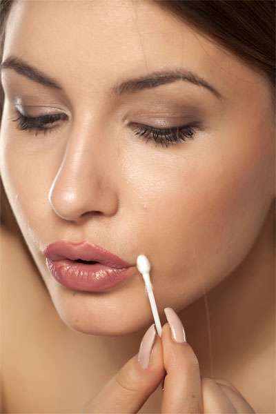 Use Q-tips or cotton swabs for makeup application of removal