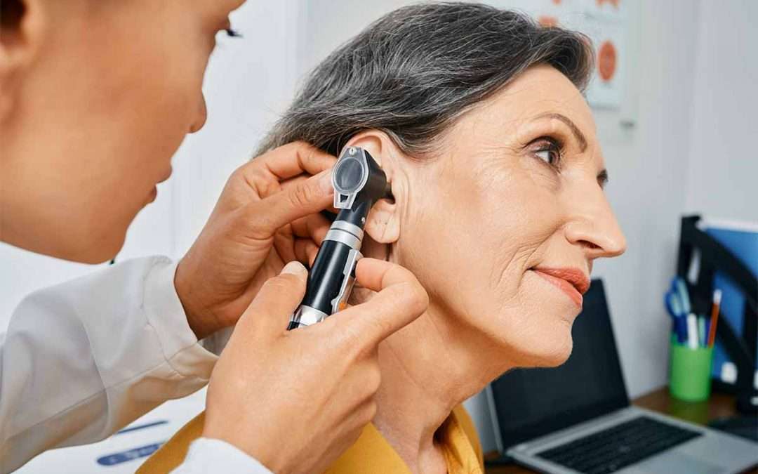 Woman being assessed for hearing loss